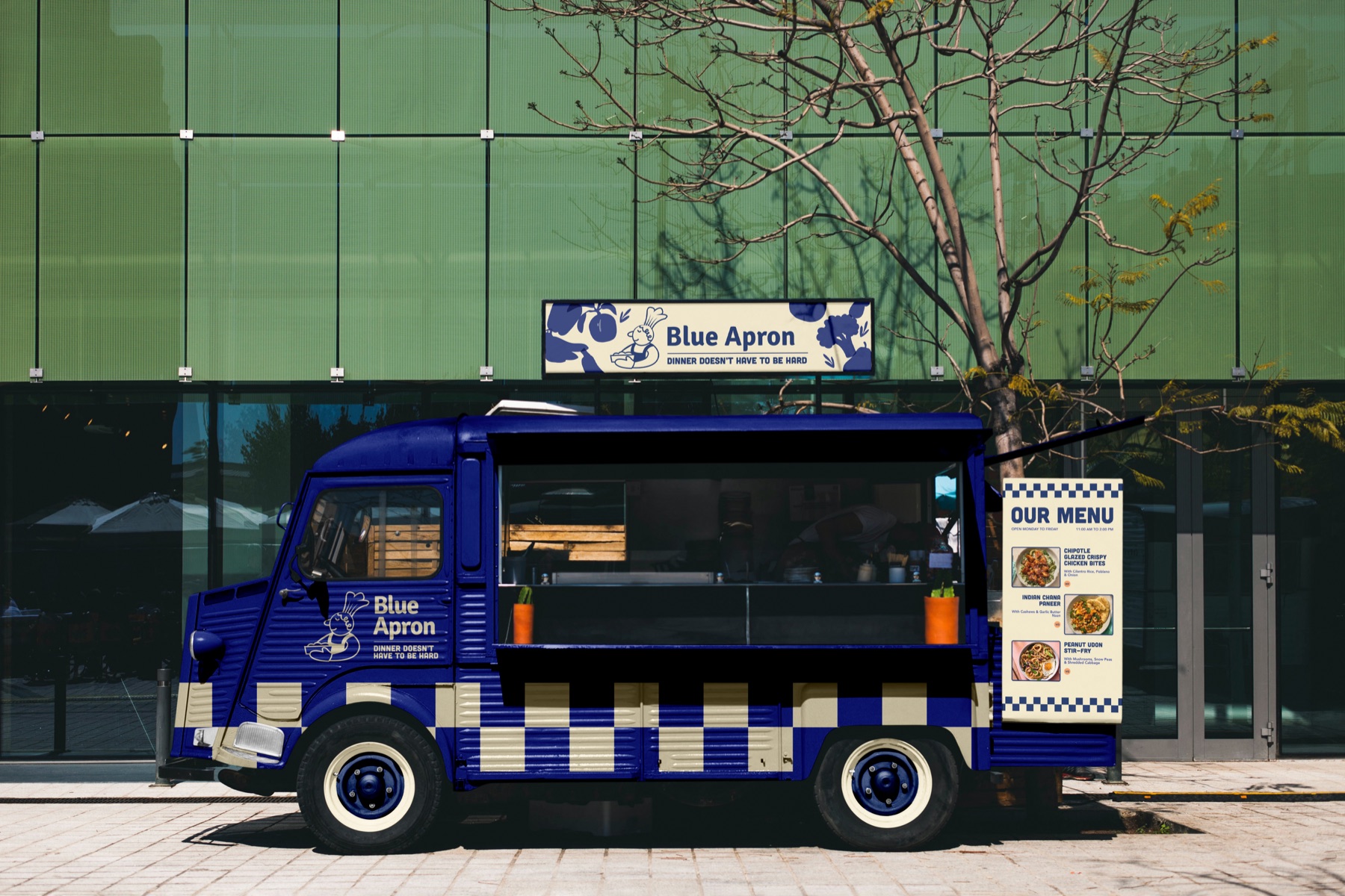 Blue Apron food truck with a checkered blue-and-cream wrap