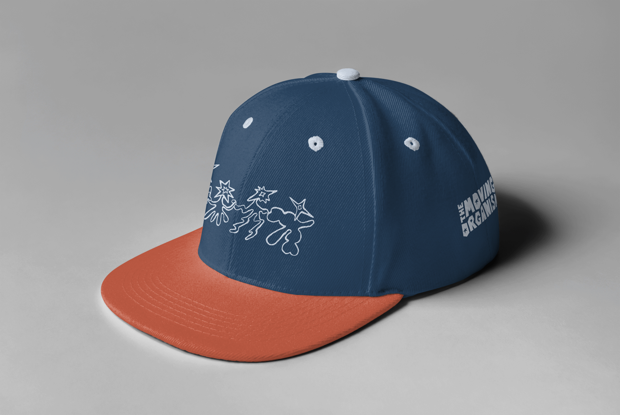 Navy baseball cap with an orange brim, embroidered with the dancing-figures doodle and a small wordmark